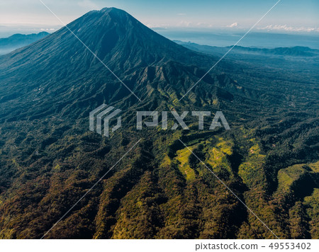 Aerial view of Agung volcano with forest in Bali 49553402