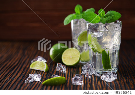 two glasses with non-alcoholic mojito cocktail two glasses with non-alcoholic mojito cocktail 49556841