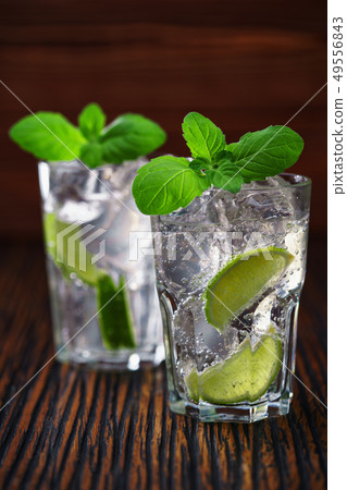 Glasses with non-alcoholic mojito cocktail 49556843