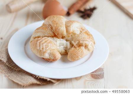 Croissant on wooden table wood and fabric select 49558063