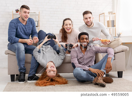 Home party. Friends playing video games online 49559005