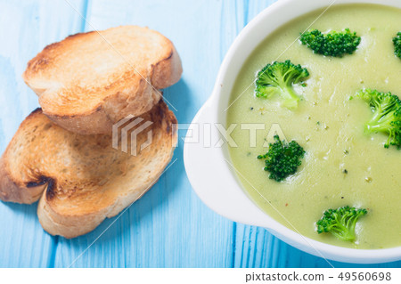 Fresh broccoli cream soup in bowl 49560698
