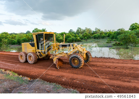 Yellow motor grader Road working Yellow motor grader Road working 49561843