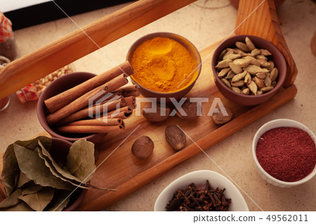 Spices and herbs on table. 49562011