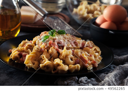 Fresh tortellini with homemade carbonara sauce Fresh tortellini with homemade carbonara sauce 49562265