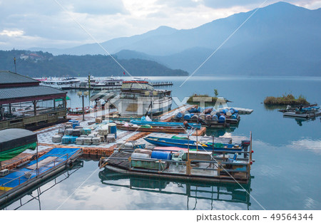 boat and speed boat dock yard in sunrise morning a 49564344