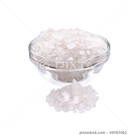 salt in a glass bowl isolated 49565062