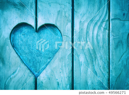 One heart shape carved in vintage wood close up One heart shape carved in vintage wood close up 49566271