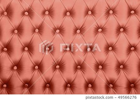 Pink capitone tufted fabric upholstery texture Pink capitone tufted fabric upholstery texture 49566276