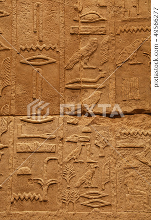 Stone wall with ancient Egyptian hieroglyphs Stone wall with ancient Egyptian hieroglyphs 49566277