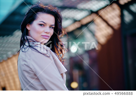 Stylish and cheerful. Beautiful young woman 49566888