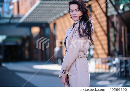 Stylish and cheerful. Beautiful young woman 49566890