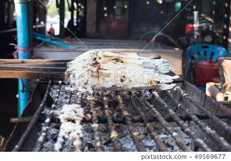 snakehead fish grilled with salt striped snakehead fish grilled with salt striped 49569677