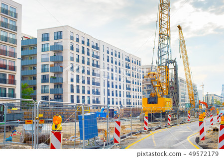 Excavator cranes construction site road 49572179