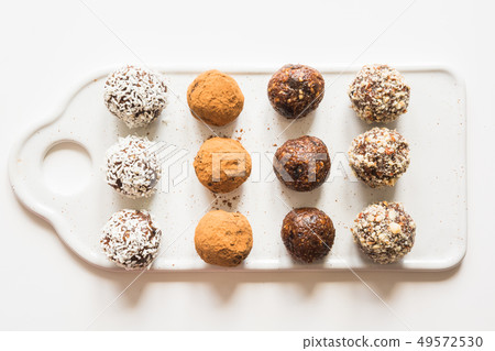 Homemade energy balls with cacao and nuts. 49572530