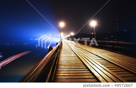 wooden bridge at night,Kanchanaburi Thailand wooden bridge at night,Kanchanaburi Thailand 49572607