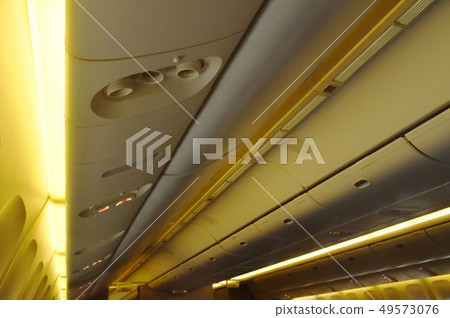 overhead cabinet for keeping passenger stuff overhead cabinet for keeping passenger stuff 49573076