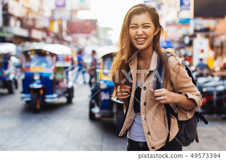 Young tourist walking and sightseeing in Bangkok, Thailand 49573394