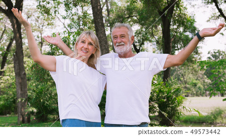 Happy old couple enjoy and relax in the park. 49573442