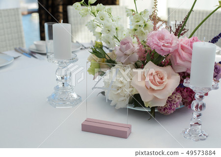 Event white restaurant table served and decorated 49573884