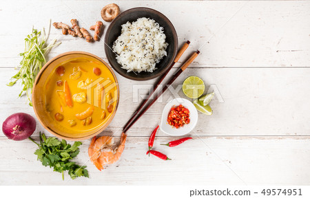 Top view composition of Thai prawn in yellow curry 49574951