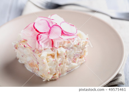Spring salad with radish, egg, and sour cream 49575461