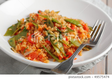Bulgur Pilaf with Green Beans and red pepper Bulgur Pilaf with Green Beans and red pepper 49575474