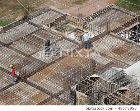 Workers fabricating steel reinforcement bar Workers fabricating steel reinforcement bar 49575958