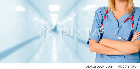 Woman doctor working at the hospital office. 49578456
