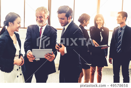 Many businessmen and businesswomen group meeting. 49578658