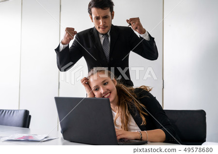 Boss feels angry and mad at bad employee. 49578680