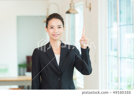 Working woman black suit 49580388