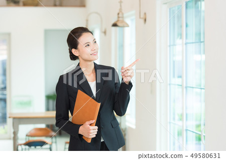 Working woman black suit 49580631