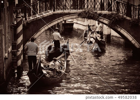 Gondola in canal in Venice Gondola in canal in Venice 49582038