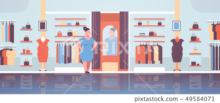 fat obese woman trying on new dress overweight girl looking at mirror fashion boutique shop clothes 49584071