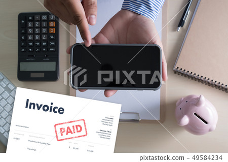 Close-up man work Invoice Bill Paid Payment At Close-up man work Invoice Bill Paid Payment At 49584234