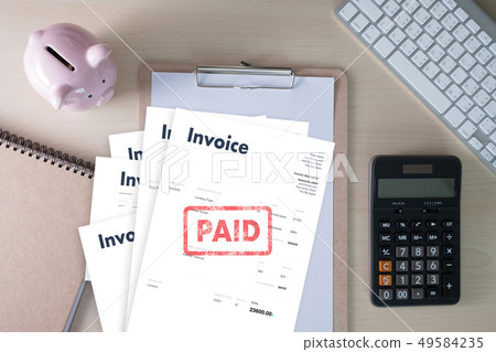 Close-up man work Invoice Bill Paid Payment At Close-up man work Invoice Bill Paid Payment At 49584235