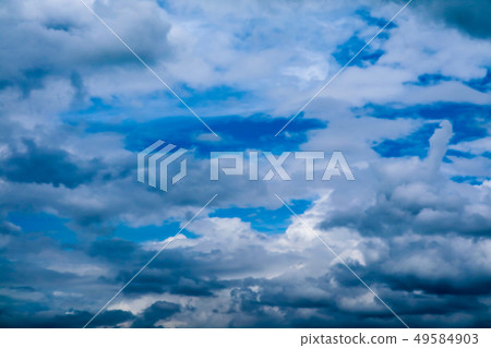 blur white heap cloud sunshine in summer  blue sky 49584903