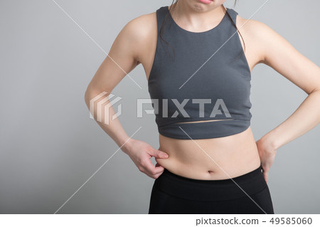 Young Japanese woman who eats stomach belly Diet image Young Japanese woman who eats stomach belly Diet image 49585060