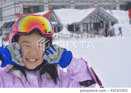 Girl at the ski resort Girl at the ski resort 49585901