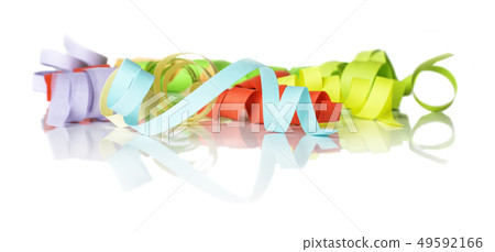 Multicolored streamers on a white background 49592166
