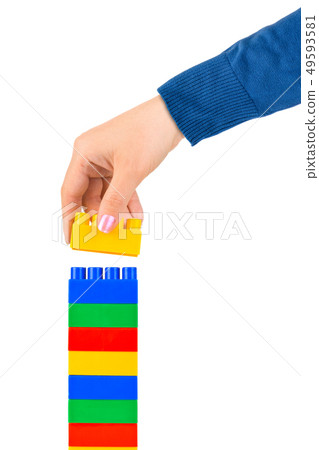 Hand and toy tower 49593581