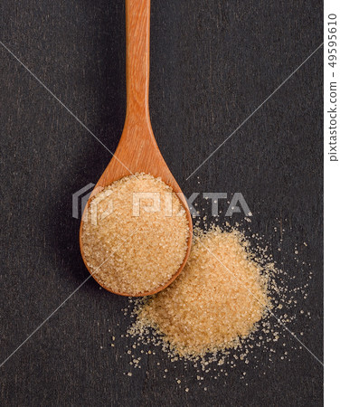 brown sugar on black background 49595610
