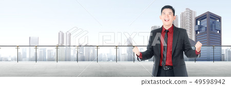 Successful asian businessman standing on modern Successful asian businessman standing on modern 49598942