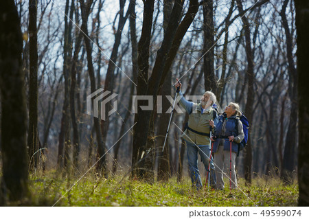 Travel and tourism. Family couple enjoying walk together Travel and tourism. Family couple enjoying walk together 49599074