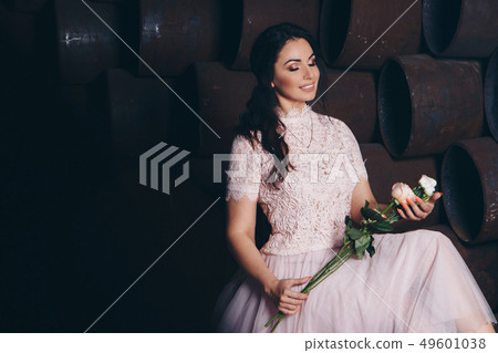March 8: beautiful girl in a light dress with March 8: beautiful girl in a light dress with 49601038