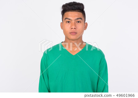 Young Asian man looking at camera against white background 49601966