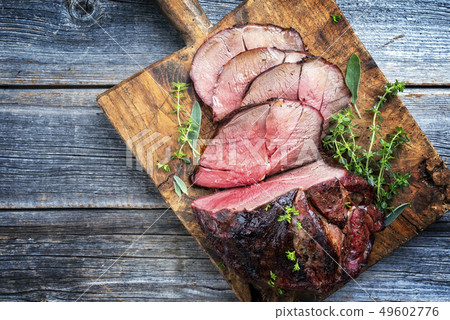 Barbecue dry aged haunch of venison Barbecue dry aged haunch of venison 49602776