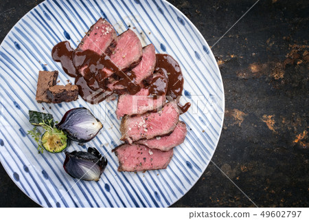 Barbecue wagyu aged fillet steak slices  49602797