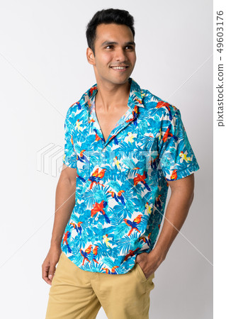 Portrait of young happy Indian tourist man thinking Portrait of young happy Indian tourist man thinking 49603176